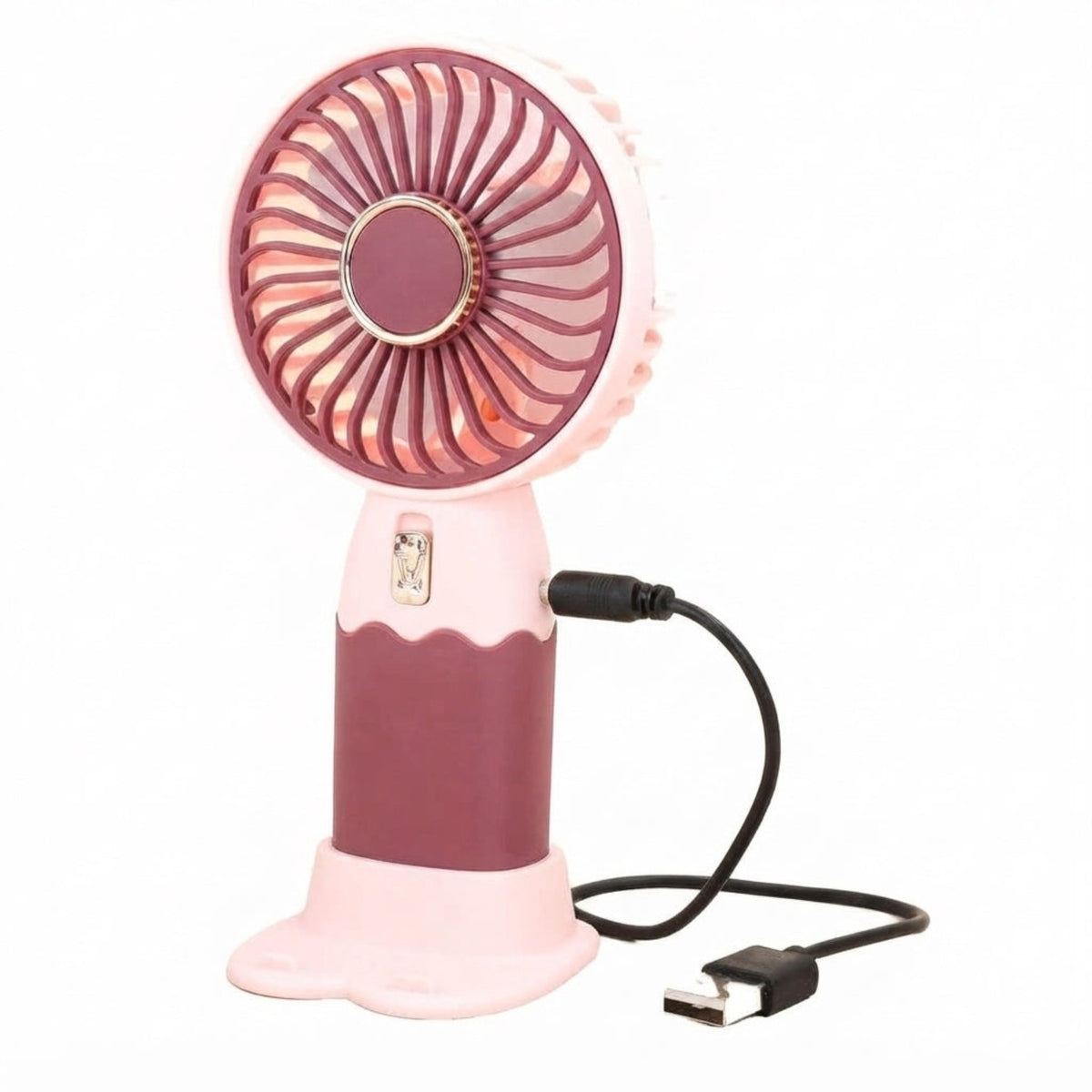 BreezeGo rechargeable handheld fan in pink with USB charging cable and stand