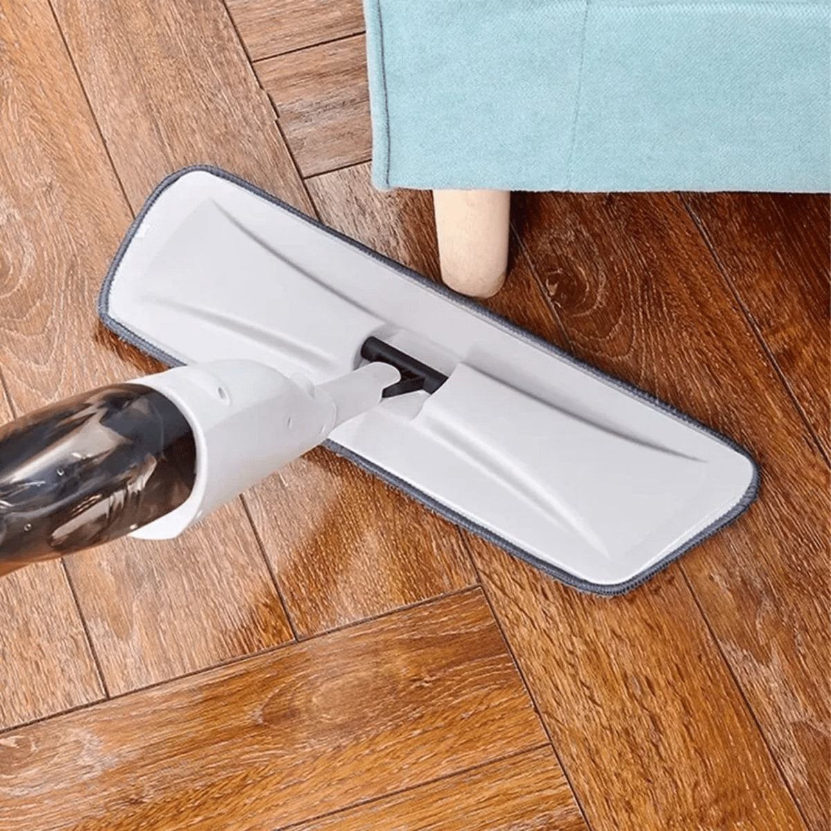 EasyClean spray mop cleaning under low furniture