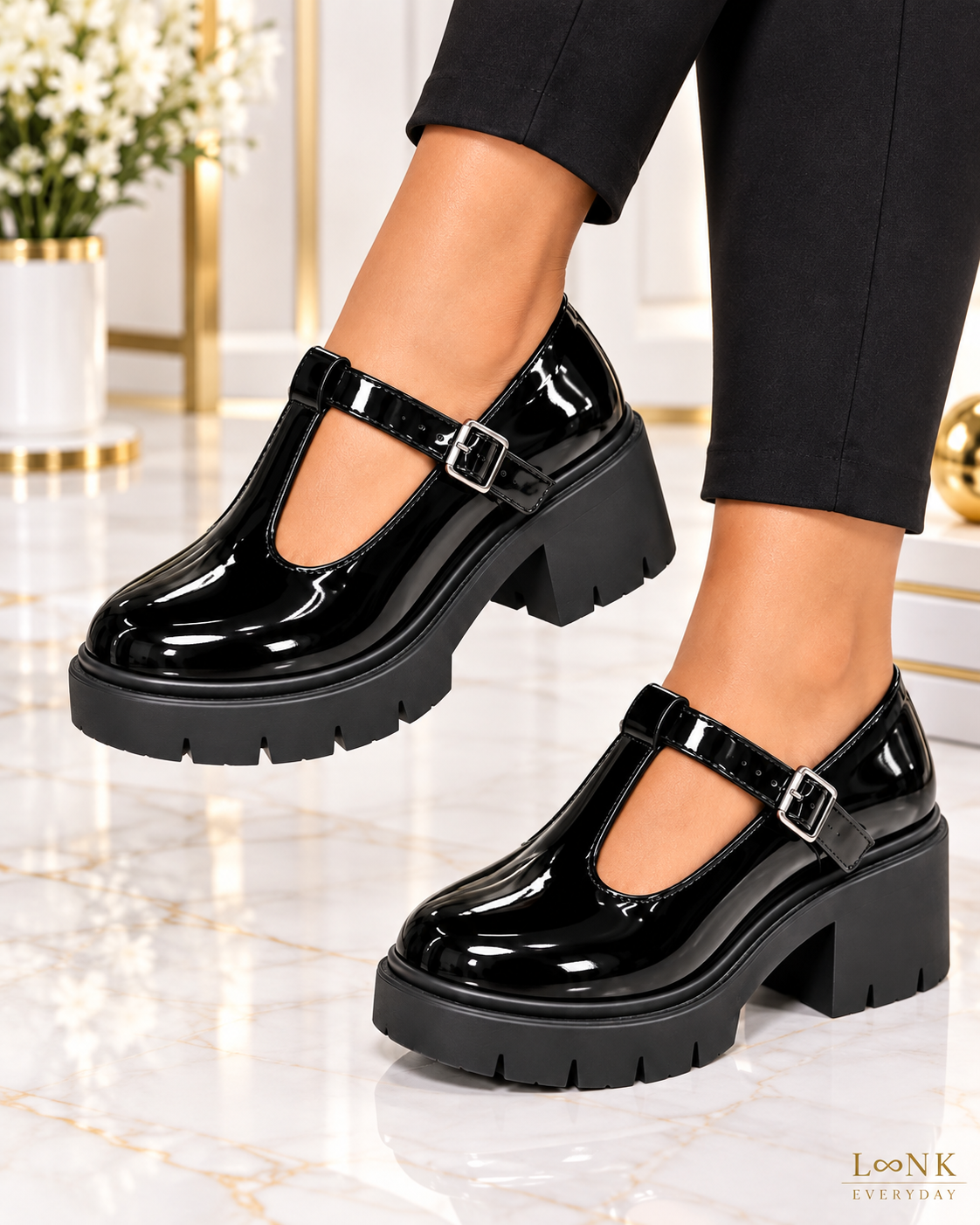 LinkEveryday black patent T-bar platform heels worn as a left and right pair